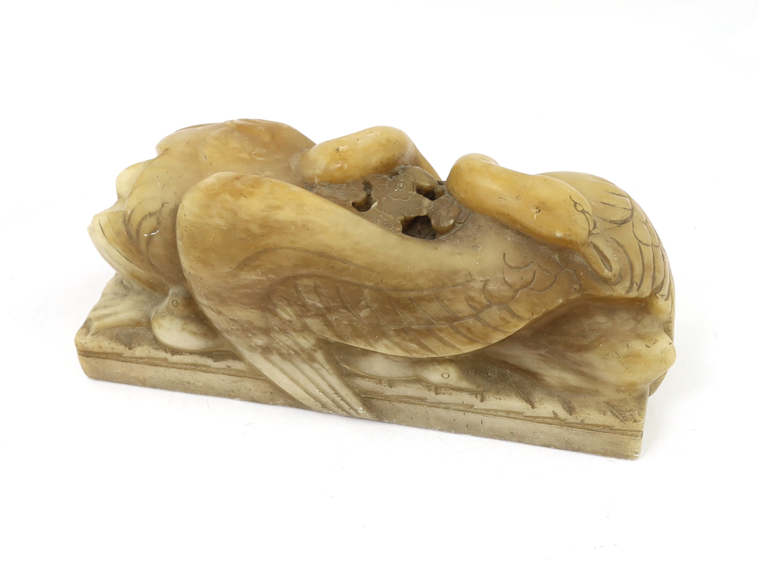 William McMillan A.R.A. (1887-1997), a carved alabaster group 'Swans', 43cm wide, 18cm high
